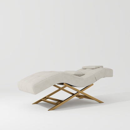 A black luxurious beauty bed with plush foam padding and Gold stainless steel legs, designed for relaxation and support in beauty settings.