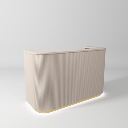 premium cream salon reception desk with gold accents and LED lighting in modern salon interior
